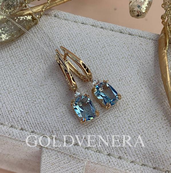 Нежные серьги из красного золота с Топазом